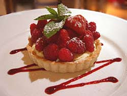 White chocolate, mascarpone and raspberry tart